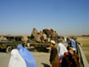 Women in Burkas in Front of Convoy